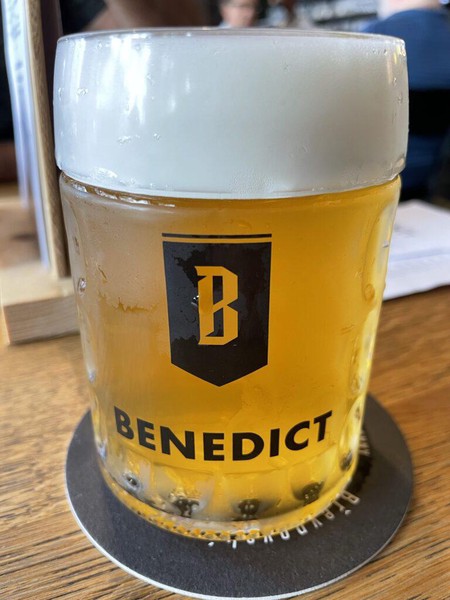 Draft Pivovarský Dům Benedict pale lager in glass mug with brewery logo