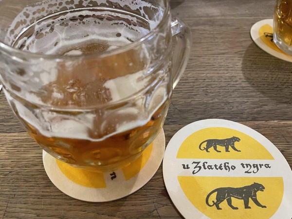 Draft Pilsner Urquell in glass mug at Zlatého Tygra