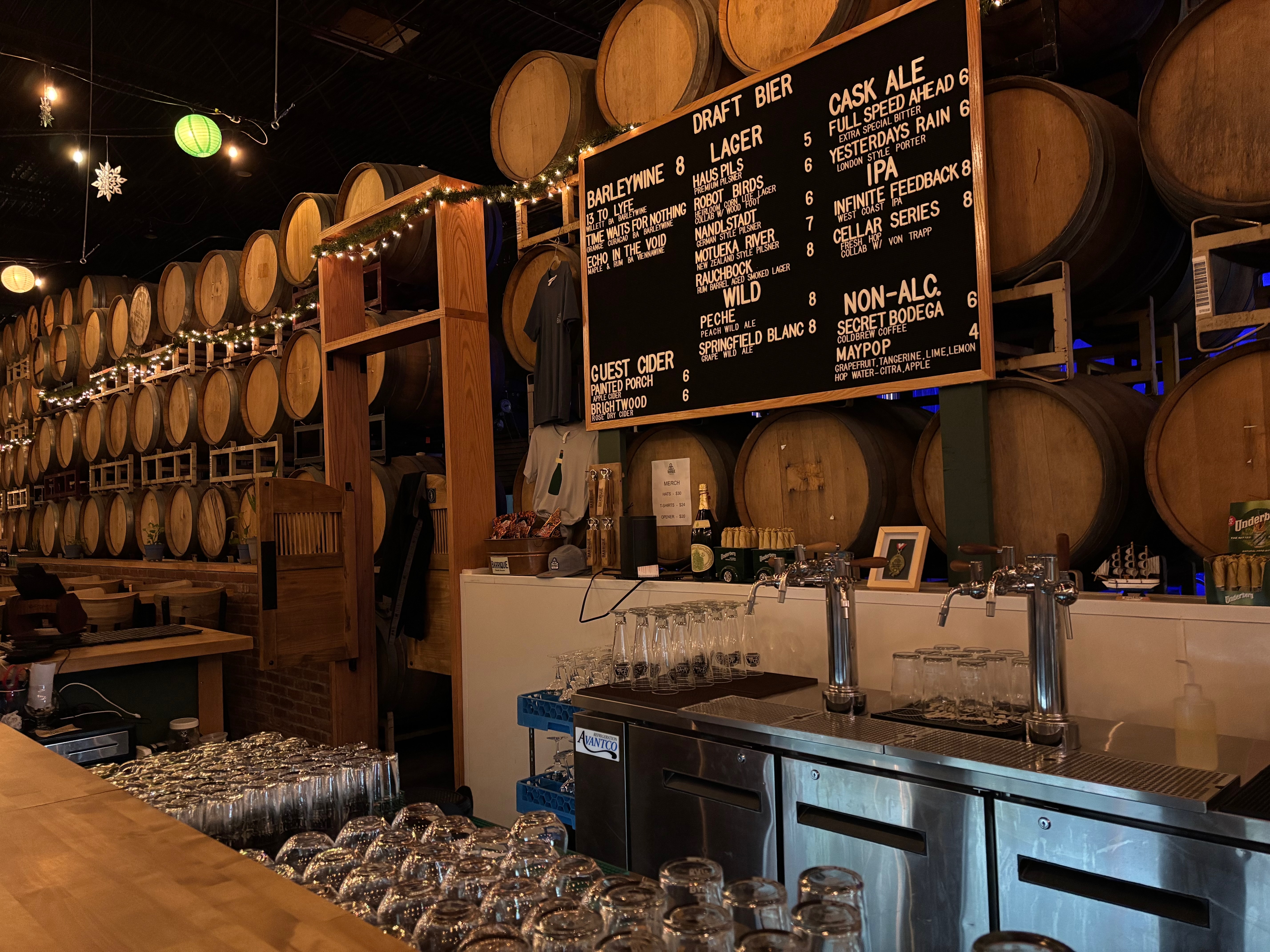 Bar at Barrique Brewing with many of their 500 barrels in the background